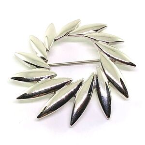 vintage Monet brooch pin silver tone modern abstract leaves wreath round sun